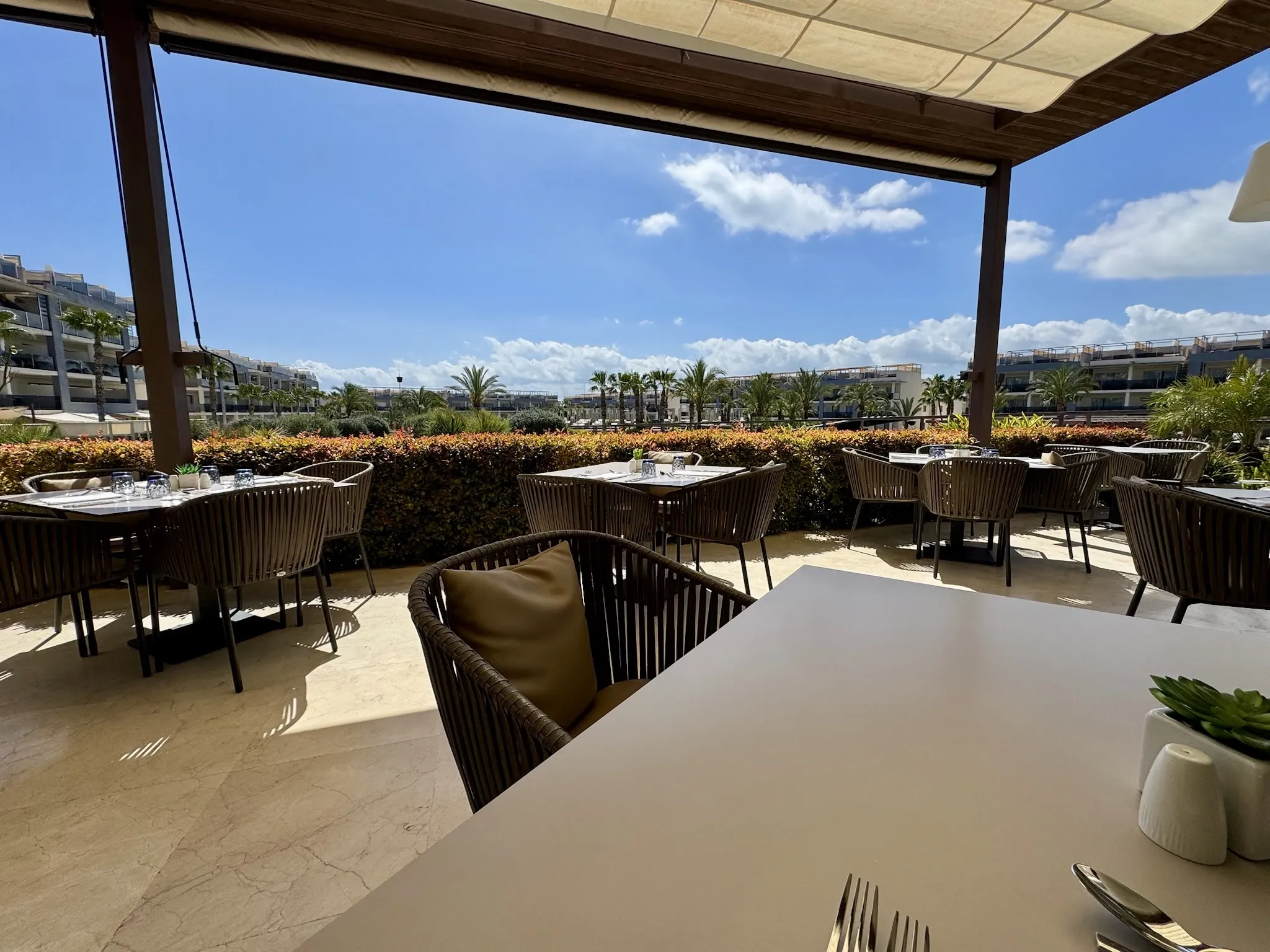 Empty Hotel Restaurant with a clear Blue Sky and a nice view